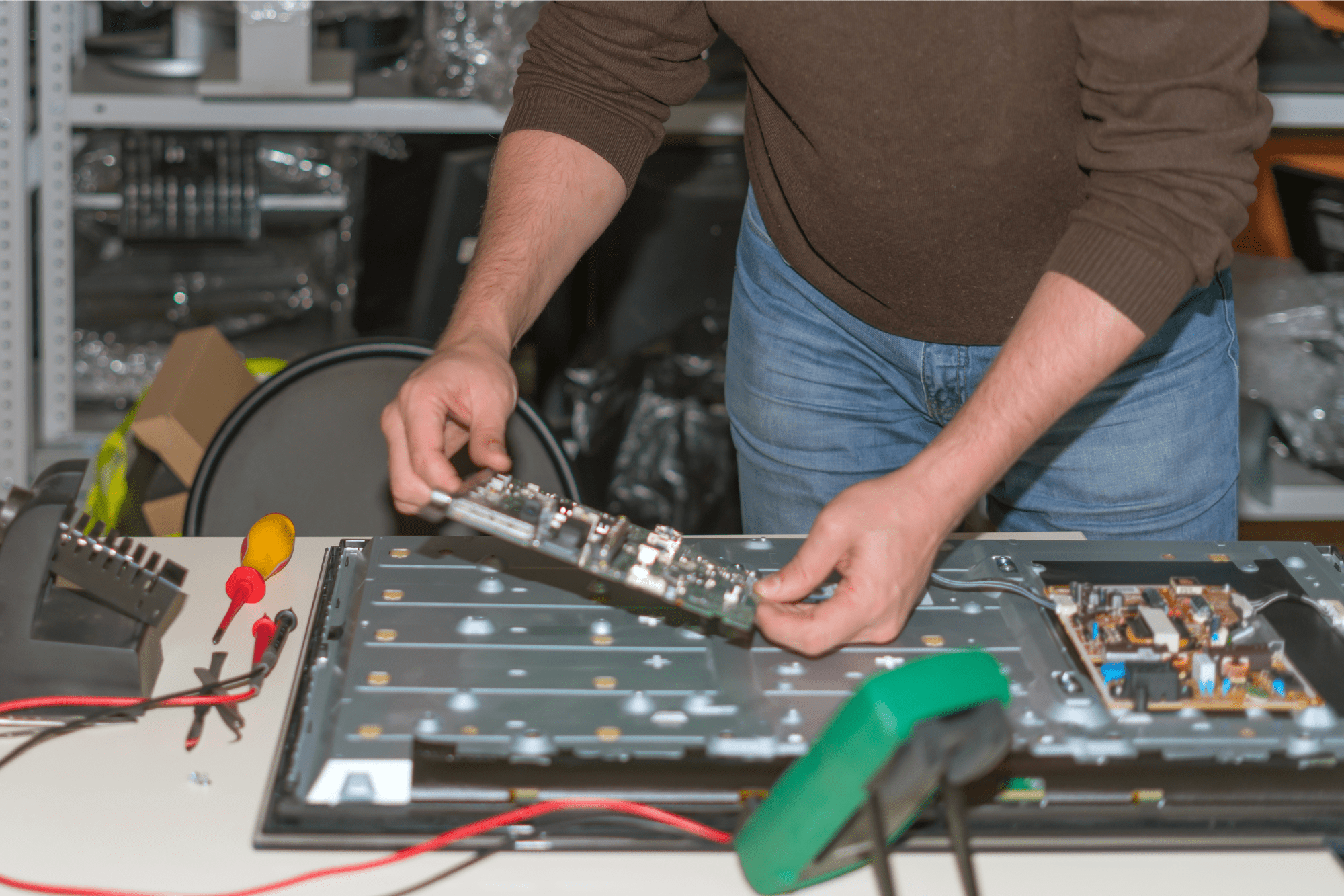 Professional TV Repair Services technician Repairing Broken Tv